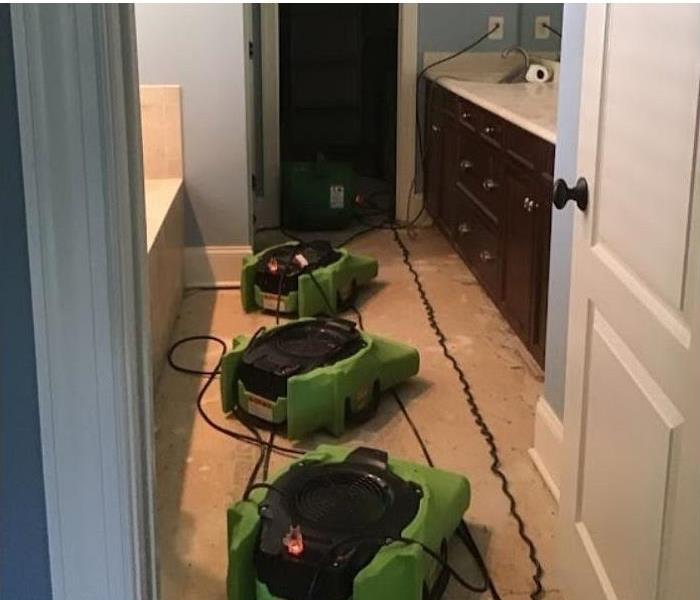 SERVPRO drying equipment being used in bathroom
