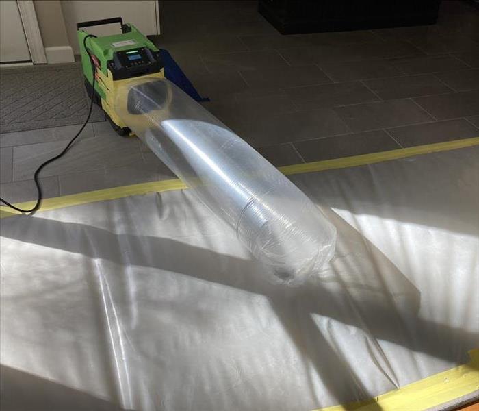 flex tubing drying a floor