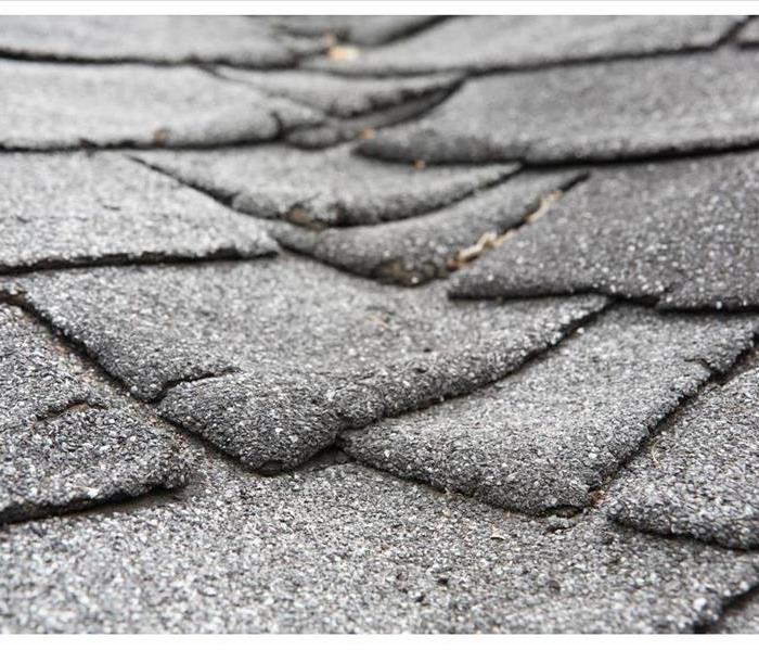 Cracks in asphalt shingle roof